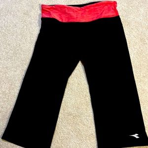 Cropped athletic pants with a flare.
